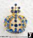 Crown Pin: Blue Rhinestone Gold Tone Crown Brooch