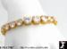 Bracelet: Cubic Zirconia Graduated Tennis Bracelet Gold Tone