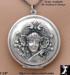 Locket: Sterling Silver Art Nouveau Style Repousse Locket